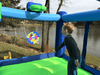 Image of Residential Bounce House - Island Hopper Shady Play Game Room Bounce House - The Bounce House Store