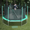 Image of bouncing on the magic circle trampoline with safety enclosure