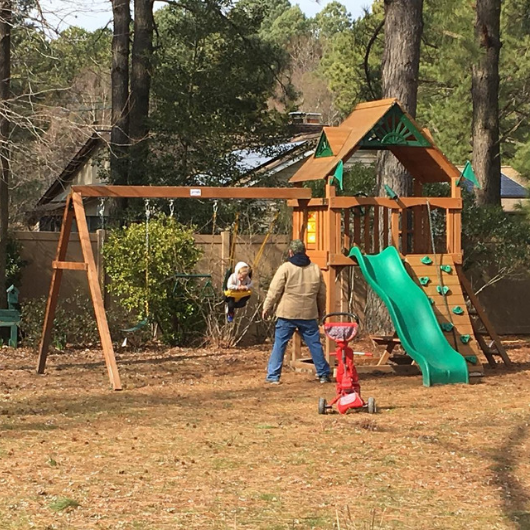 chateau swing set with wooden roof