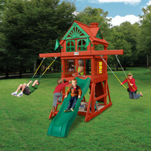 kids playing outdoors on the gorilla five star space saver swing set